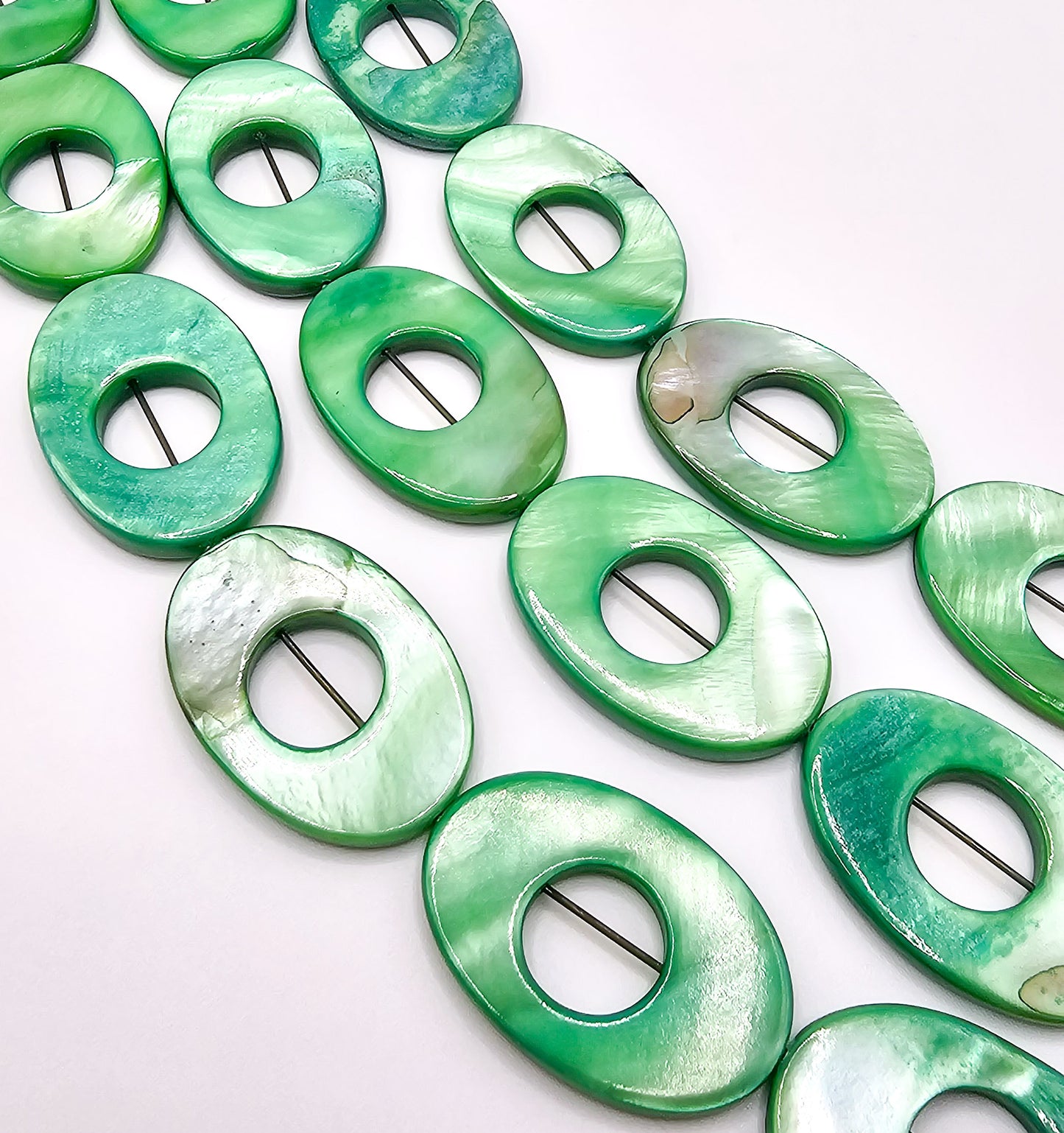 Green AB Coated Mother of Pearl Oval Beads – Full 16" Strand