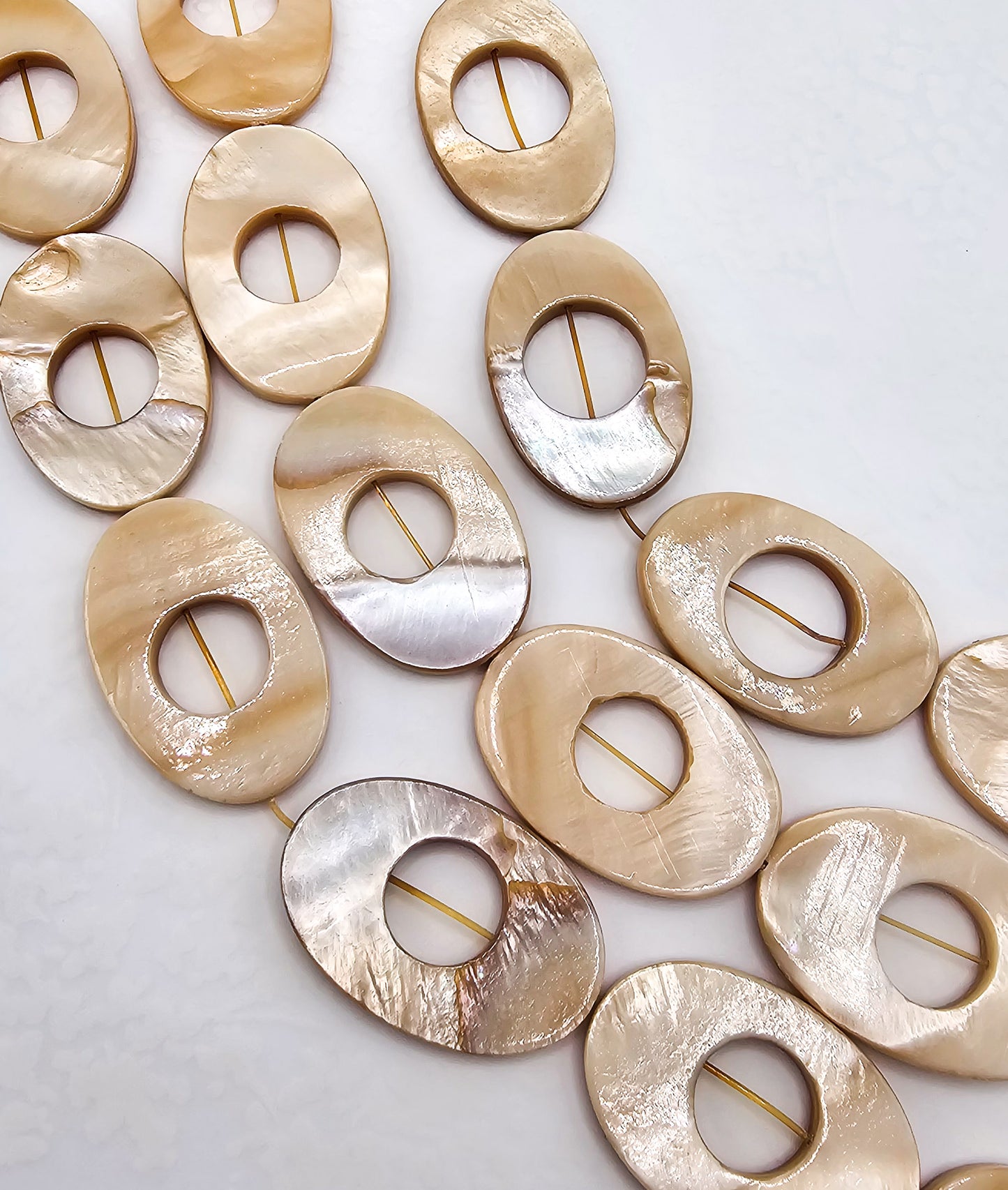 Orange AB Coated Mother of Pearl Oval Beads – Full 16" Strand