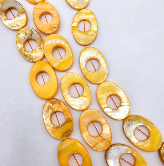 Orange AB Coated Mother of Pearl Oval Beads – Full 16" Strand