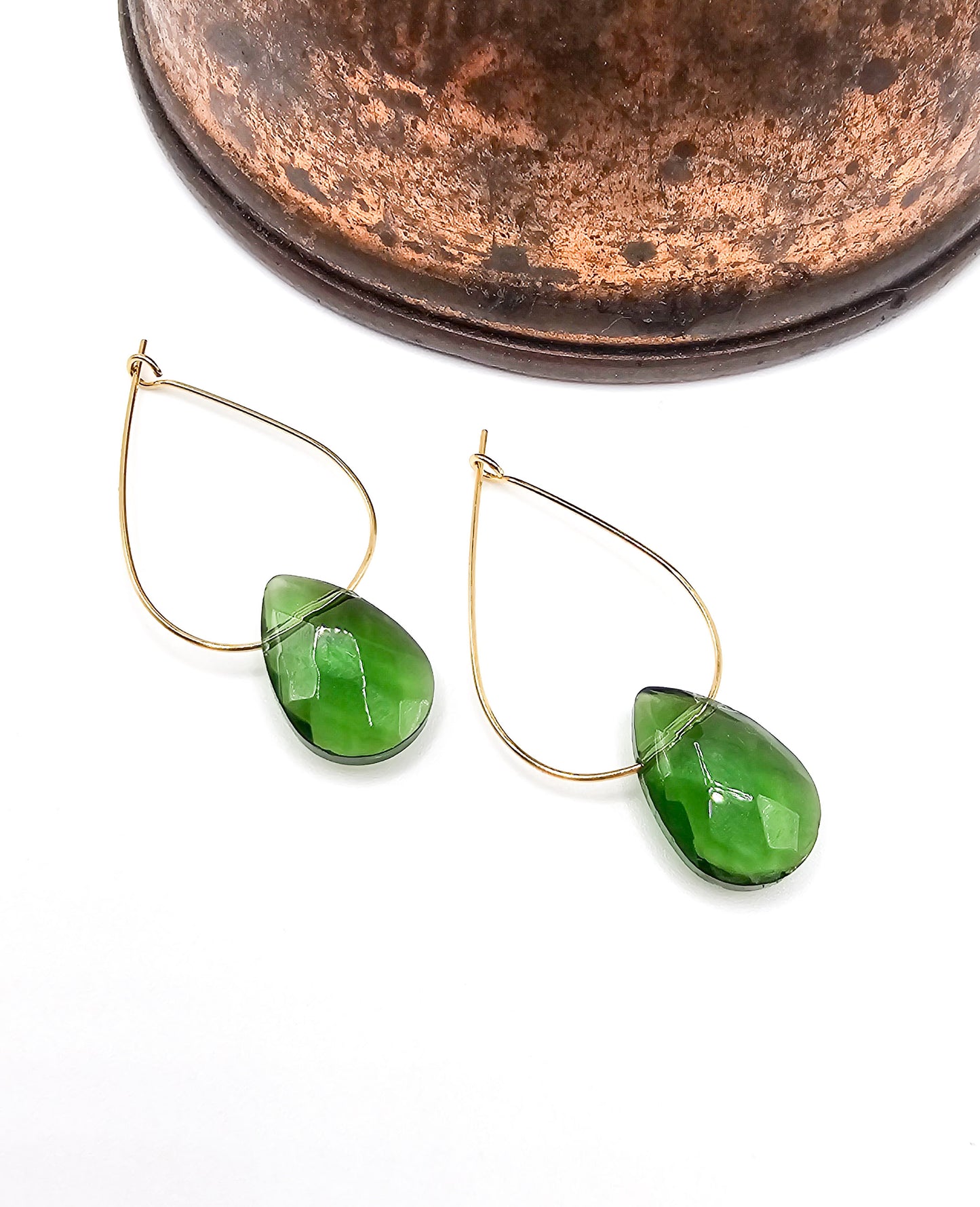 Green glass peridot teardrop briolette earrings.